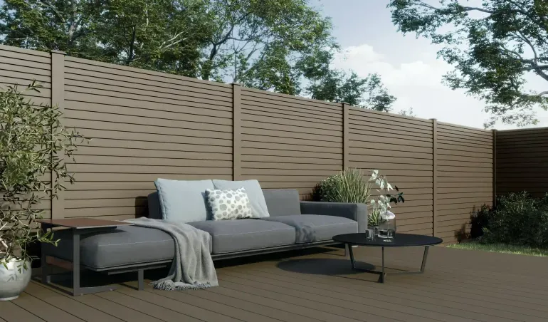 Step 4: Install the first decking board
Slide the first composite decking board into the starter clip.
Use the grooves on the side of the board to do this.
Make sure the board is installed into the clip completely.